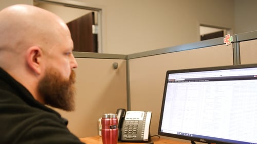 Materialogic team member reviews Infoplus report
