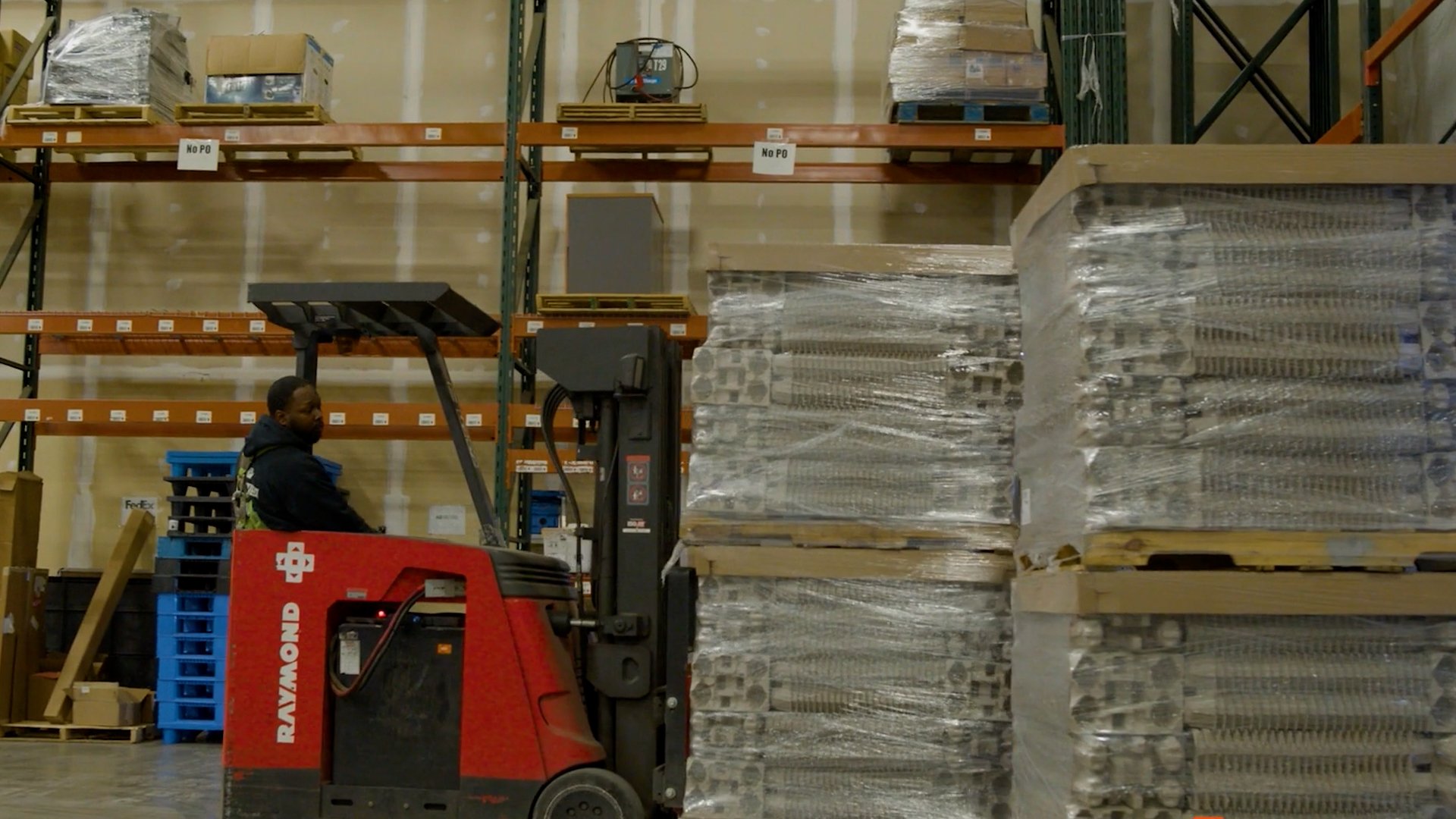 Materialogic forklift driver receiving things