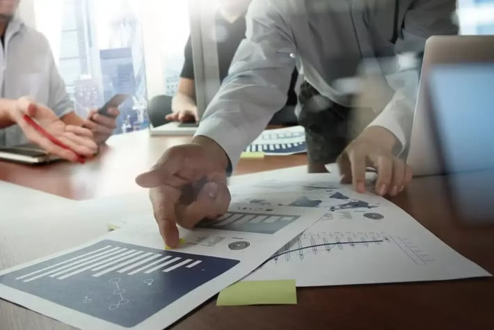 double_exposure_of_businessman_hand_working_with_new_modern_computer_and_business_strategy_as_concept-resized (1)